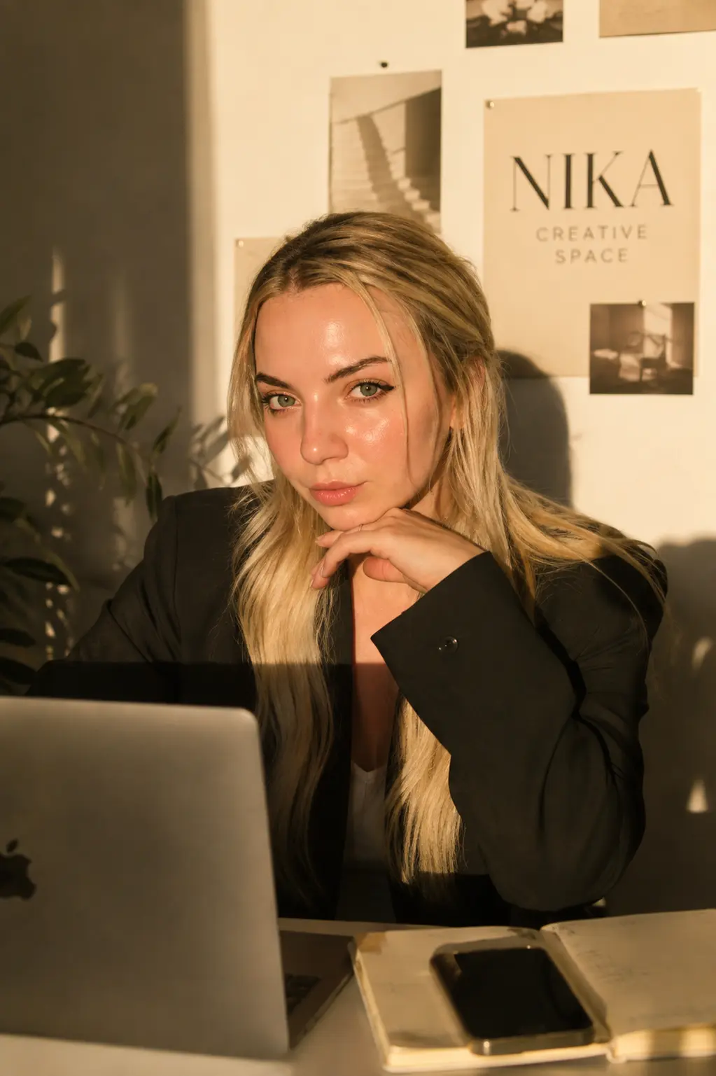 Veronika working at a laptop late in the evening